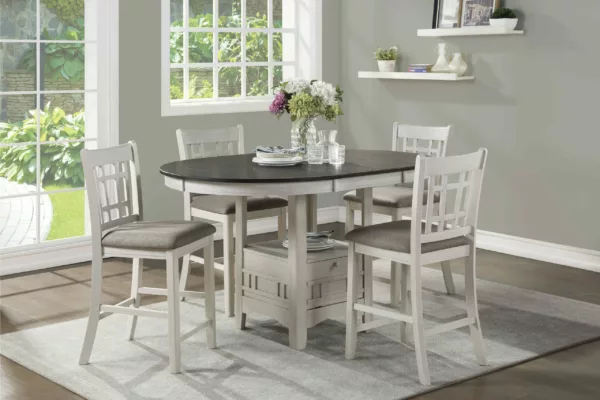 Junipero counter height table with a white finish made up of oak veneer, solid wood, and engineered wood. features Four chairs, a separate extension leaf, and a storage base with a door. Mazin Furniture 2423W-36 from Homebay Furniture.